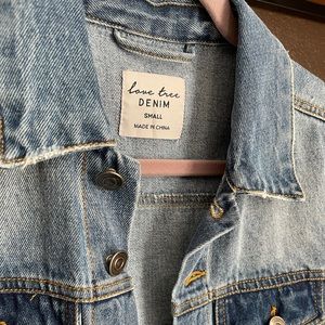 Size small denim jacket, long sleeves, hip length, 100% cotton, great condition